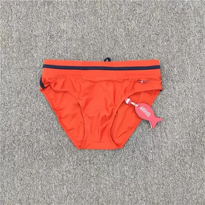 Đồ lót nam sexy băng lụa mùa hè thoáng khí thong thả eo in xu hướng trẻ cá tính hỗ trợ bìu - G-string